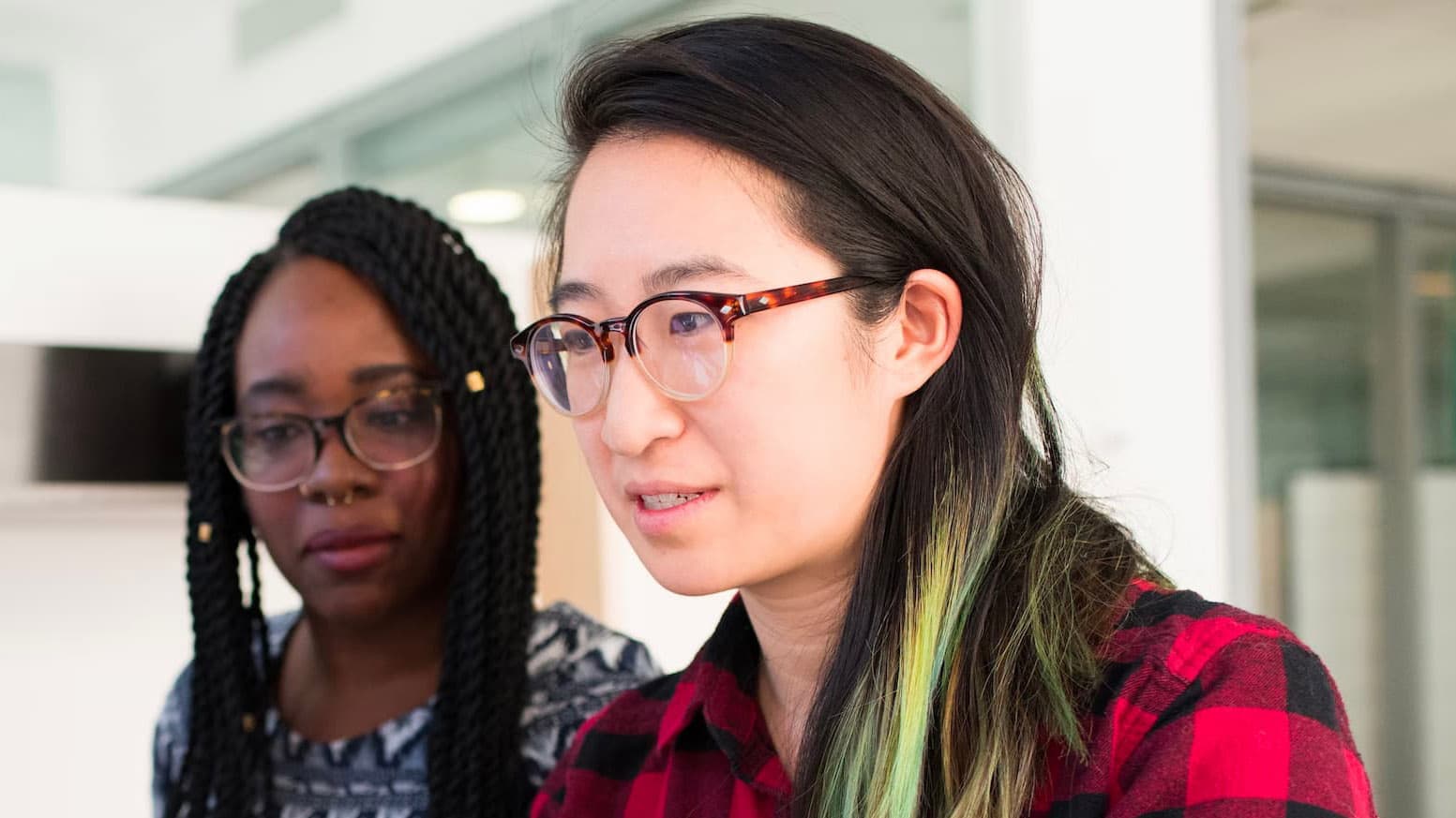 Ramit Surana at work with a colleague